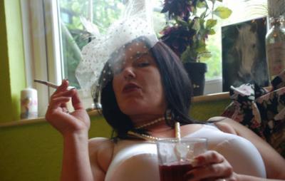 Older British amateur Juicey Janey exposes her bush while smoking & drinking 28627935