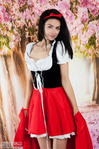 Dark haired teen girl strips off red hiding hood outfit & over the knee socks